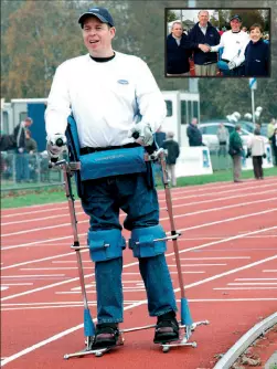 a picture of paul moore doing his walk around peterborough's athletics track